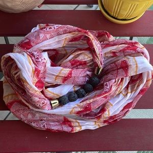 Beautiful patterned infinity scarf with aromatherapy stones